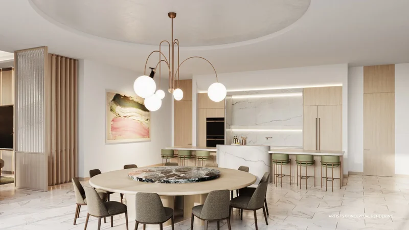 Chef’s kitchen and dining area inside a Casamar residence in Pompano Beach, Florida