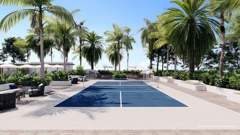 Pickleball court amenity surrounded by palm trees at Casamar in Pompano Beach