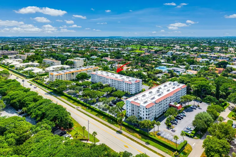 Aerial view highlighting a Tierra Del Mar condo building near the ocean in Boca Raton, Florida