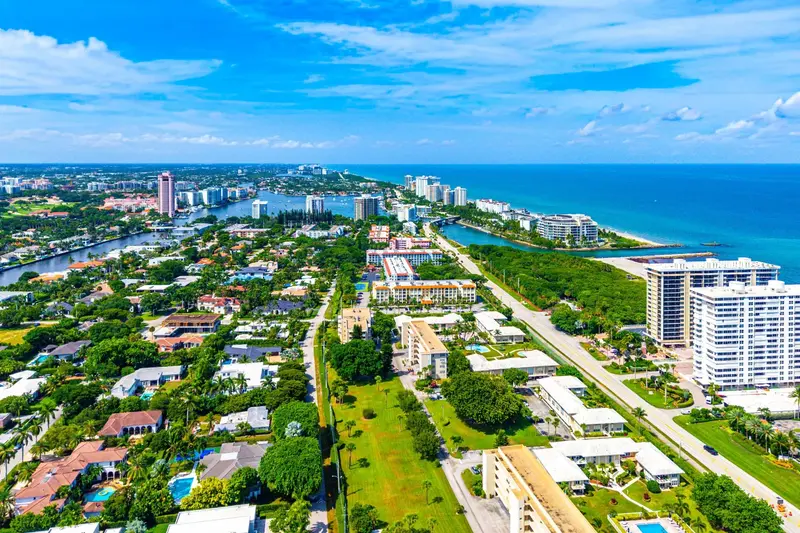 Aerial coastal view of Tierra Del Mar Condos near the Atlantic Ocean and Boca Raton Inlet