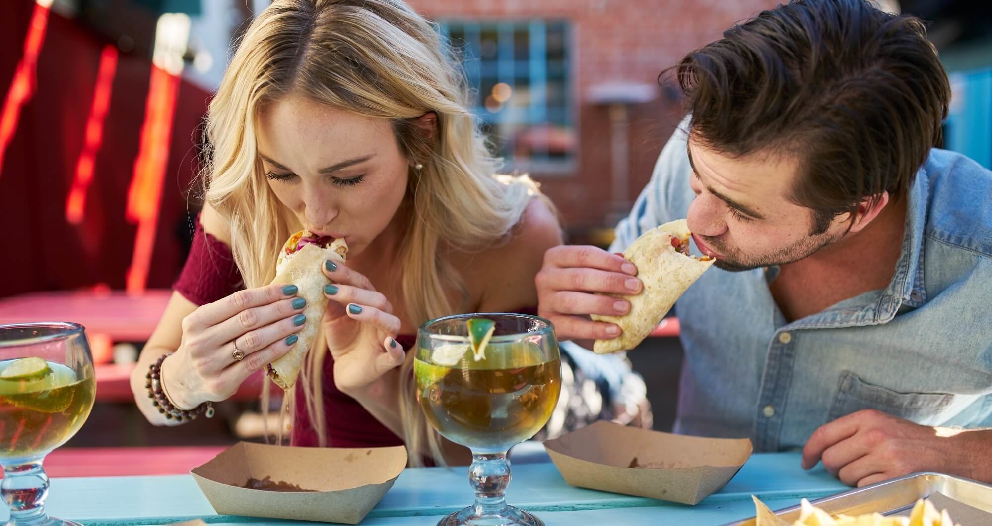Couple eating tacos in East Nashville